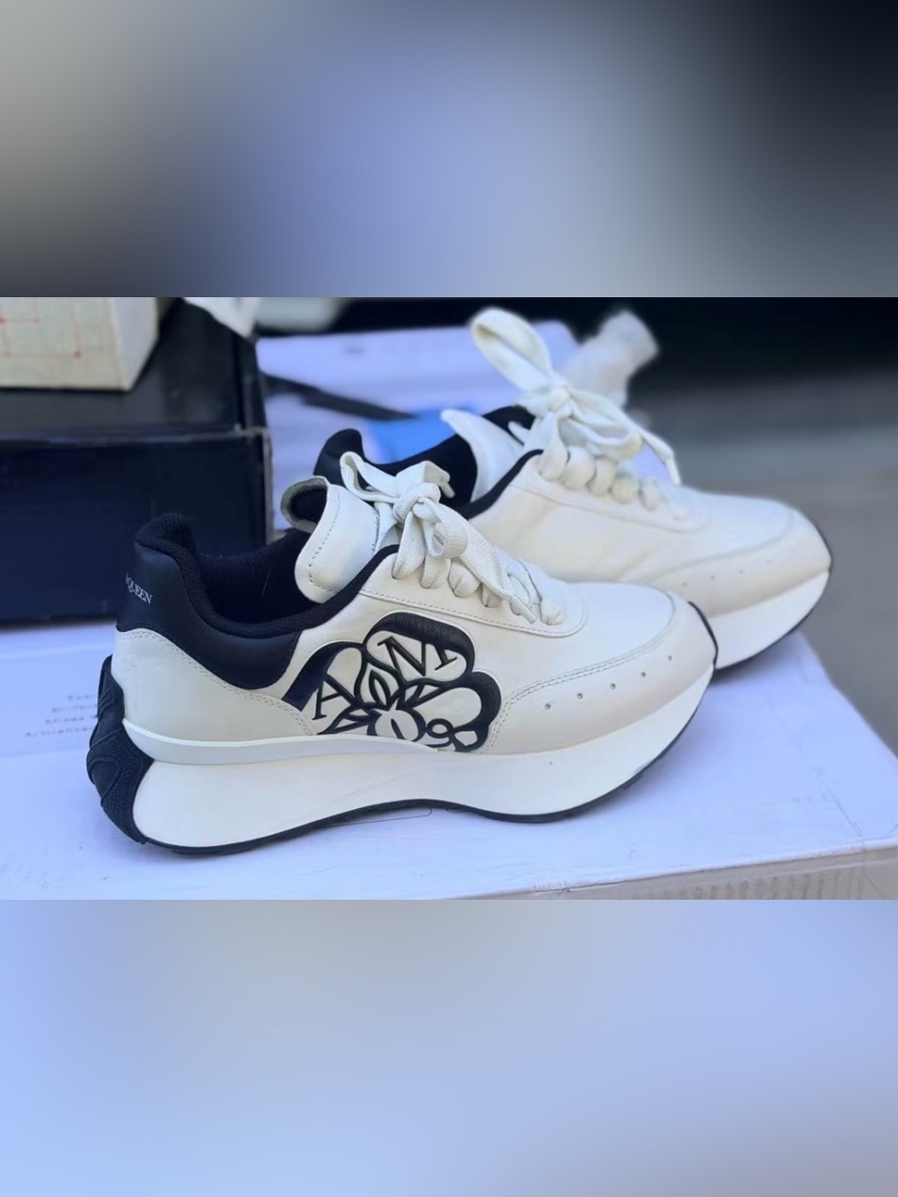 Alexander McQueen White Leather Sneakers with Black Floral Graphic
